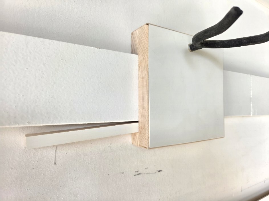 Close-up of the actual Goat Garages locking pin mounted through a cleat holder and wall rail
